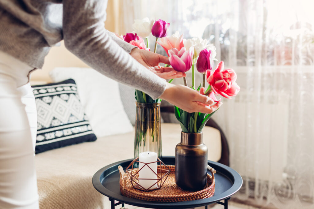 Arranging flowers in vase